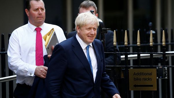 European leaders congratulate Johnson but warn of challenging times ahead European leaders congratulate Johnson but warn of challenging times ahead