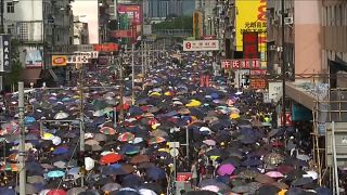 Watch: Police and protesters clash in Hong Kong protest against mob attack