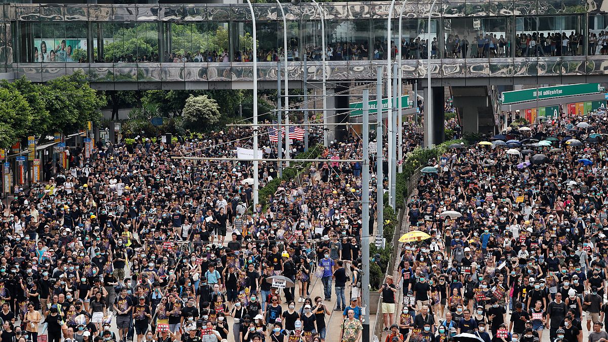 Protesters in Hong Kong defy authorities and march again