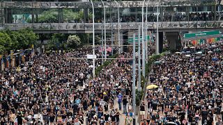 Protesters in Hong Kong defy authorities and march again