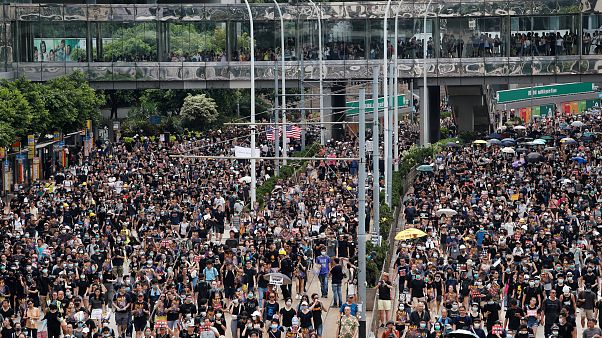 Protesters in Hong Kong defy authorities and march again Protesters in Hong Kong defy authorities and march again