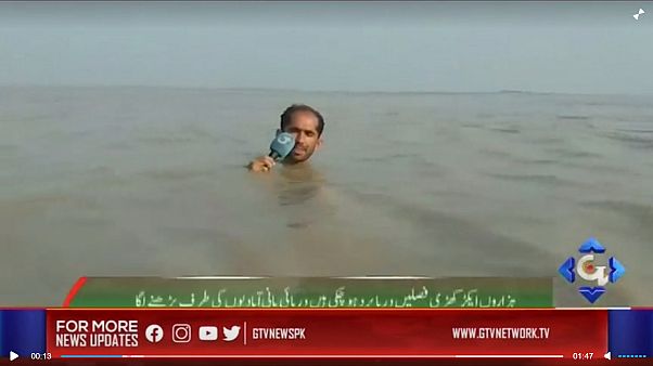 Reporter in Pakistan goes live from neck-deep floodwaters Reporter in Pakistan goes live from neck-deep floodwaters