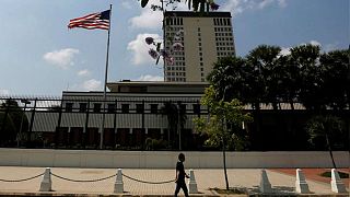  A man walks in front of the U.S. Embassy in Phnom Penh, Cambodia, April 14, 2018. REUTERS/Samrang Pring