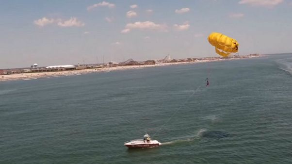 Watch: Basketball star Julian McClurkin scores trick shot while parasailing Watch: Basketball star Julian McClurkin scores trick shot while parasailing