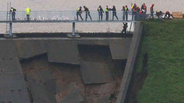 British military helping shore up damaged dam as risk of flooding of UK town rises British military helping shore up damaged dam as risk of flooding of UK town rises