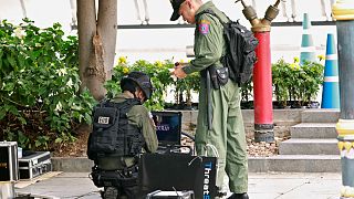 Police Explosive Ordnance Disposal (EOD) officers work following a small explosion at a site in Bangkok, Thailand, August 2, 2019. 