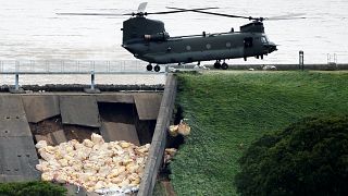 Dam repairs continue but threat to English town remains