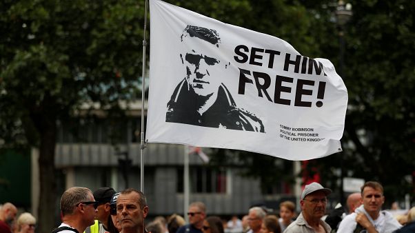 Supporters of far-right activist Tommy Robinson protest outside the Houses of Parliament in London, July 11, 2019. Supporters of far-right activist Tommy Robinson protest outside the Houses of Parliament in London, July 11, 2019.