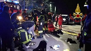 Emergency personnel attend to victims of a stampede at a nightclub in Corinaldo, near Ancona, Italy,  in this handout picture obtained by Reuters December 8, 2018.