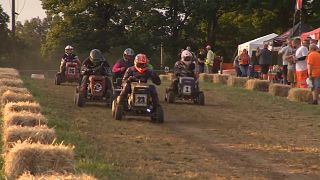 A cut above: Contestants race lawnmowers in UK endurance event
