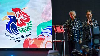 Left: Tun Dr. Mahathir Mohamad, Prime Minister of Malaysia; Right: YB Datuk Mohamaddin bin Ketapi, Minister of Tourism, Arts and Culture Malaysia