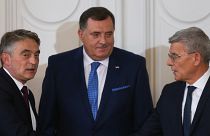 Bosnian leaders from three largest ethnic parties form government 10 months after election