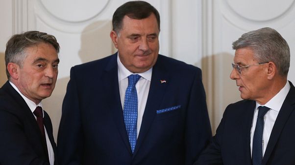 Bosnian leaders from three largest ethnic parties form government 10 months after election Bosnian leaders from three largest ethnic parties form government 10 months after election