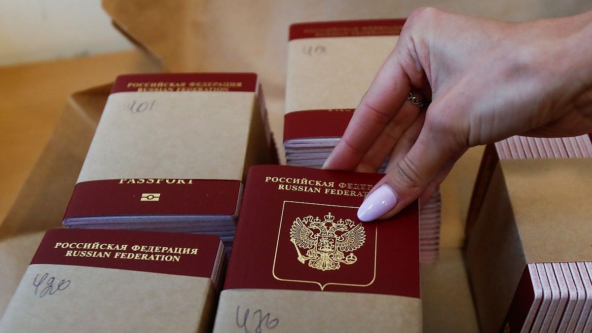Estonia says it won't recognise Russian passports Putin has offered in Ukraine