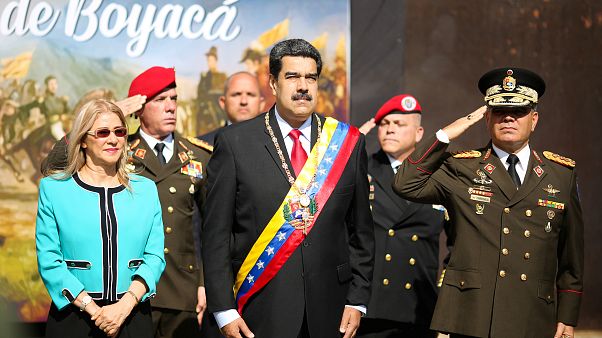 El presidente de Venezuela, Nicolas Maduro, junto a su esposa y el ministro de Defensa Vladimir Padrino El presidente de Venezuela, Nicolas Maduro, junto a su esposa y el ministro de Defensa Vladimir Padrino
