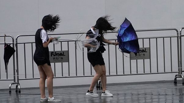 Typhoon forces evacuations, flight cancellations in eastern China Typhoon forces evacuations, flight cancellations in eastern China