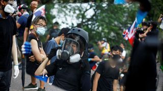 Police fire tear gas at anti-government protesters in Hong Kong