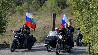 What protests? Putin rides with Night Wolves bikers in Crimea