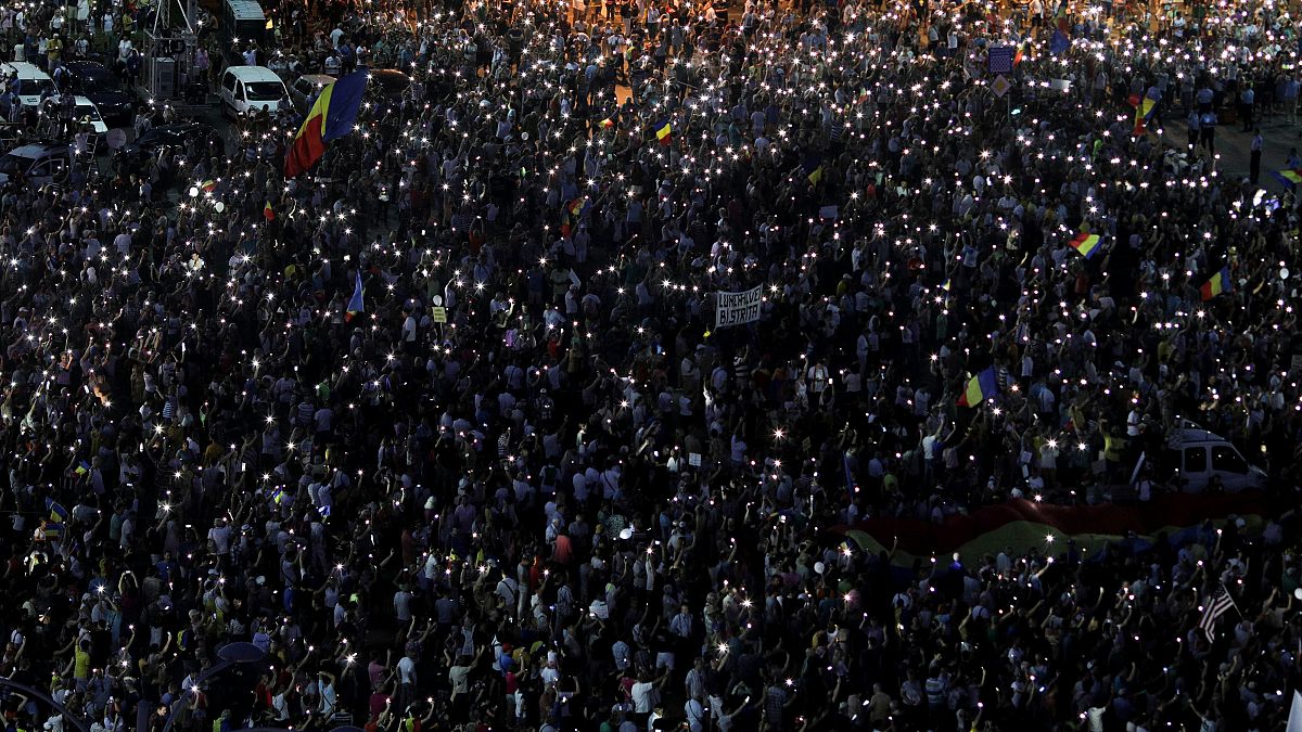 Thousands rally in Bucharest on anniversary of violent protest