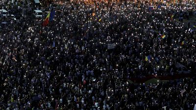 Thousands rally in Bucharest on anniversary of violent protest