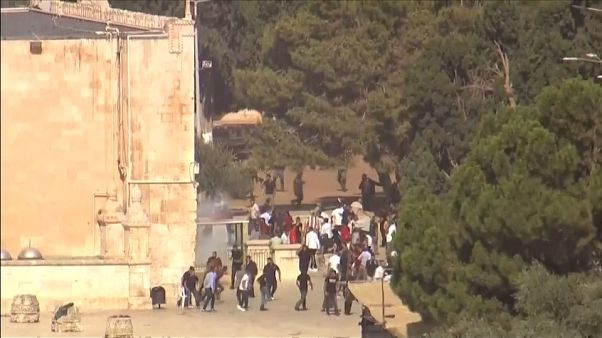 Israeli police clash with Palestinians at Eid al-Adha gathering in Jerusalem Israeli police clash with Palestinians at Eid al-Adha gathering in Jerusalem