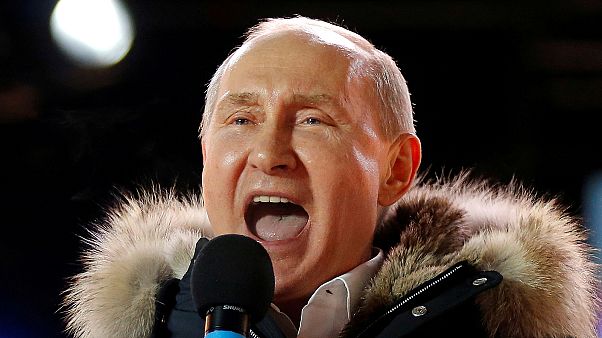 Putyin egy 2018-as nagygyűlésen, amelyen a Krím visszacsatolását ünnepelték Putyin egy 2018-as nagygyűlésen, amelyen a Krím visszacsatolását ünnepelték
