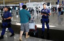 Hong Kong : retour au calme à l'aéroport, Pékin dénonce des agressions "quasi-terroristes"