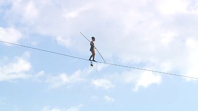 French tightrope walker wows Czech crowd with Vltava River crossing