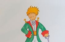 Antoine de Saint-Exupéry A kis herceg című regényének címlapjához készített akvarell illusztrációjának litográfiája a szegedi Móra Ferenc Múzeumban 2015. május 7-én.