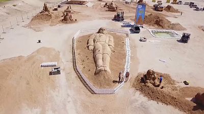 Giant sand sculptures bring fairy tales to life