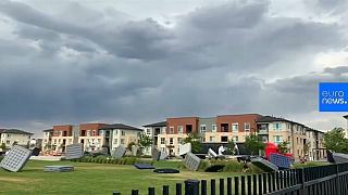 Dozens of beds go flying across a park in Denver, Colorado