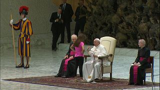 'Don’t worry, let her be!' Young girl wanders on stage during pope’s audience