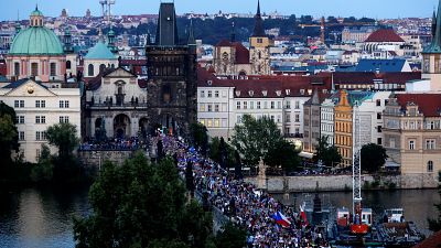 Demonstrators march during a protest rally demanding resignation of Czech Prime Minister Andrej Babis and President Milos Zeman.
