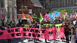 Activists from the climate protest group Extinction Rebellion march in London.