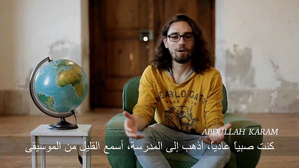 عبد الله كرم متحدثاً إلى أسوشييتد برس عبد الله كرم متحدثاً إلى أسوشييتد برس