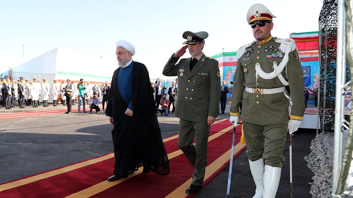 Iranian President Hassan Rouhani arrives to attend the unveiling ceremony for the domestically built mobile missile defence system Bavar-373 in Tehran, Iran August 22, 2019.
