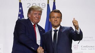 French President Emmanuel Macron shakes hands with U.S. President Donald Trump after a joint press conference at the end of the G7 summit in Biarritz, France, August 26, 2019.