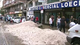 Mountains of hail outside local market in Arganda del Rey near Madrid