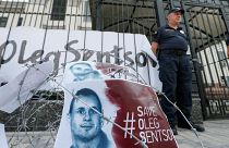 Barbed wire and placards with images of Ukrainian film director Oleg Sentsov are seen after a rally demanding the release of Sentsov