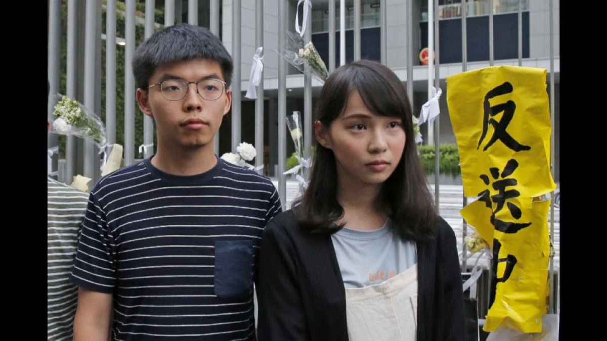Joshua Wong & Andy Chow attivisit di Pro Democracy arrestati dalla polizia di Hong Kong