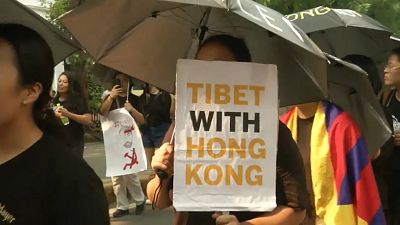 Tibeter gehen für Hongkong auf die Straße
