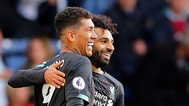 روبرتو فيرمينو و زميله محمد صلاح روبرتو فيرمينو و زميله محمد صلاح