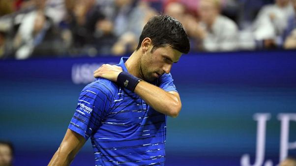 Il dolore alla spalla costringe Djokovic al ritiro. Il dolore alla spalla costringe Djokovic al ritiro.