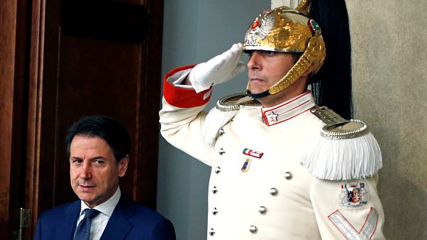 Italian Prime Minister Giuseppe Conte arrives to speak to the media after meeting with Italian President Sergio Mattarella Italian Prime Minister Giuseppe Conte arrives to speak to the media after meeting with Italian President Sergio Mattarella