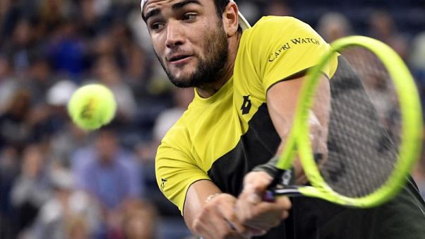 Rovescio a due mani di Matteo Berrettini. Rovescio a due mani di Matteo Berrettini.