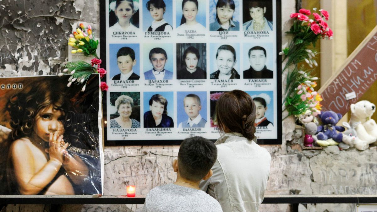 People attend a memorial ceremony marking the 15th anniversary of the deadly school siege in the town of Beslan, Russia September 1, 2019.