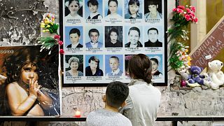 People attend a memorial ceremony marking the 15th anniversary of the deadly school siege in the town of Beslan, Russia September 1, 2019.