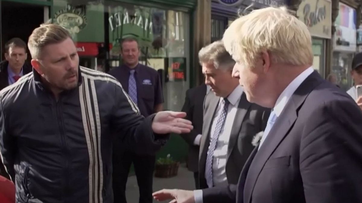 'You're playing games!' Heckler ruins Boris Johnson's charm offensive in the north of England