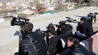 Kabil'de bir silahlı saldırıyı çeken Afgan gazeteciler