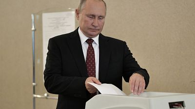 Russia's President Vladimir Putin casts his ballot at a polling station during the Moscow city parliament election in Moscow, Russia September 8, 2019.